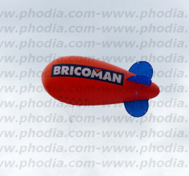 Dirigeable rouge ailerons bleu pour magasin Bricoman